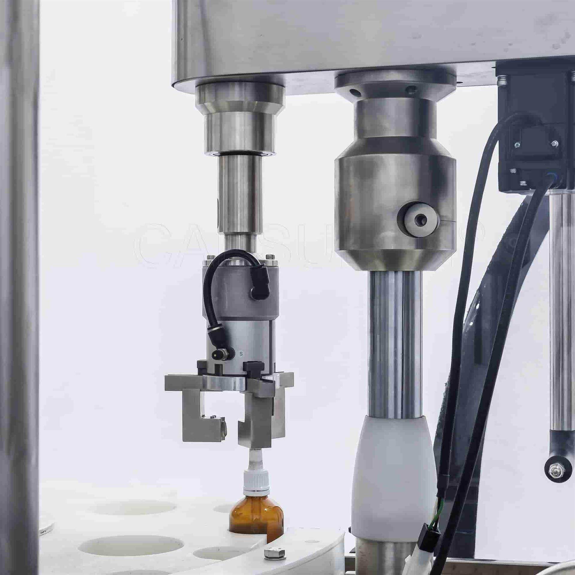 capping mechanism